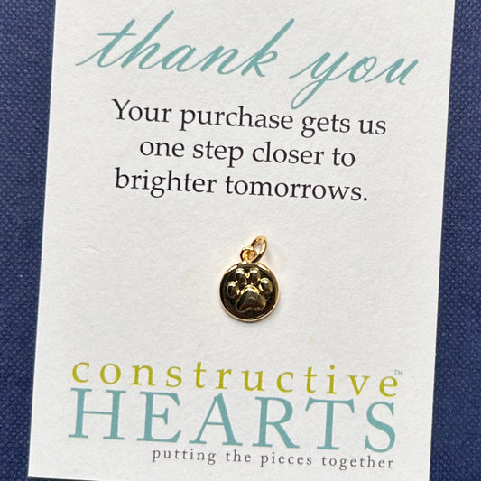 v Paw embossed circle