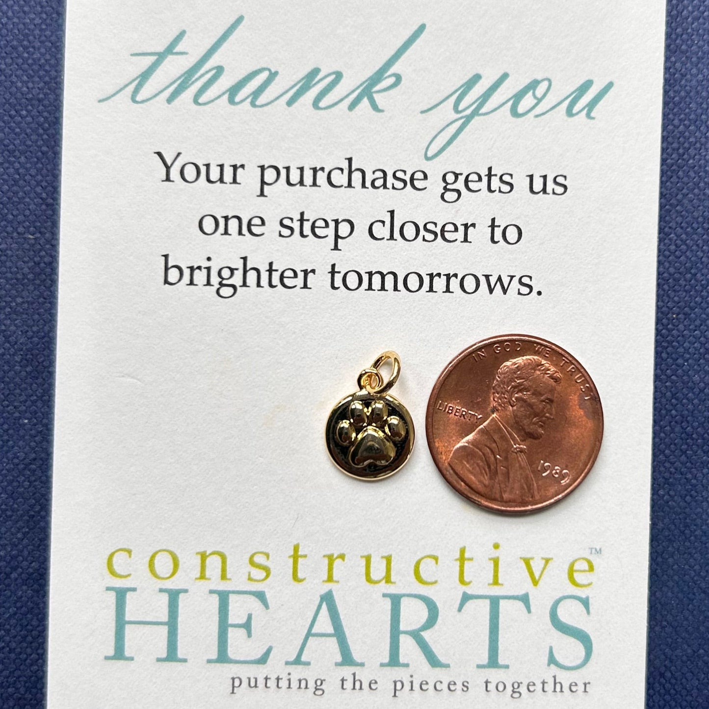 v Paw embossed circle