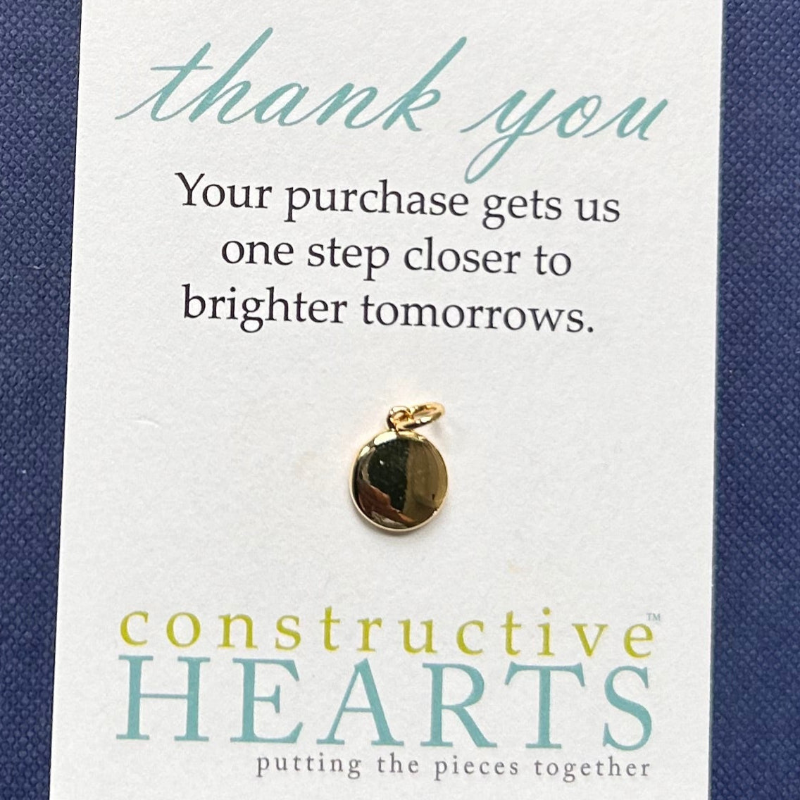 v Paw embossed circle