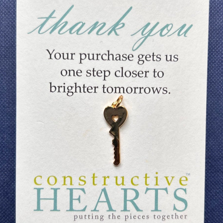 v Key large purple enamel