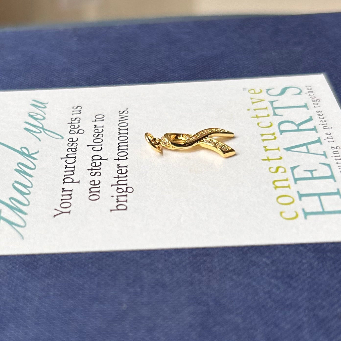 v Ribbon for a cause pave